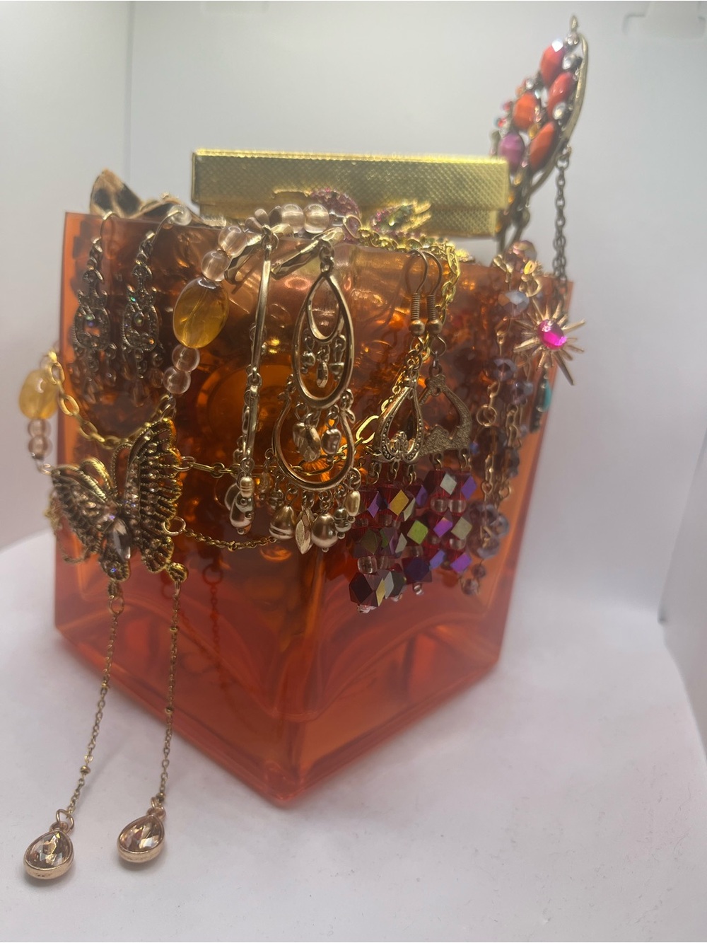 Translucent Orange Cube Cosmetic Case with Gold-Tone Accents